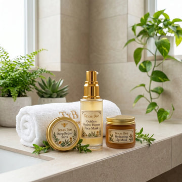 Texas Bee skincare products on a bathroom counter with plants in the background